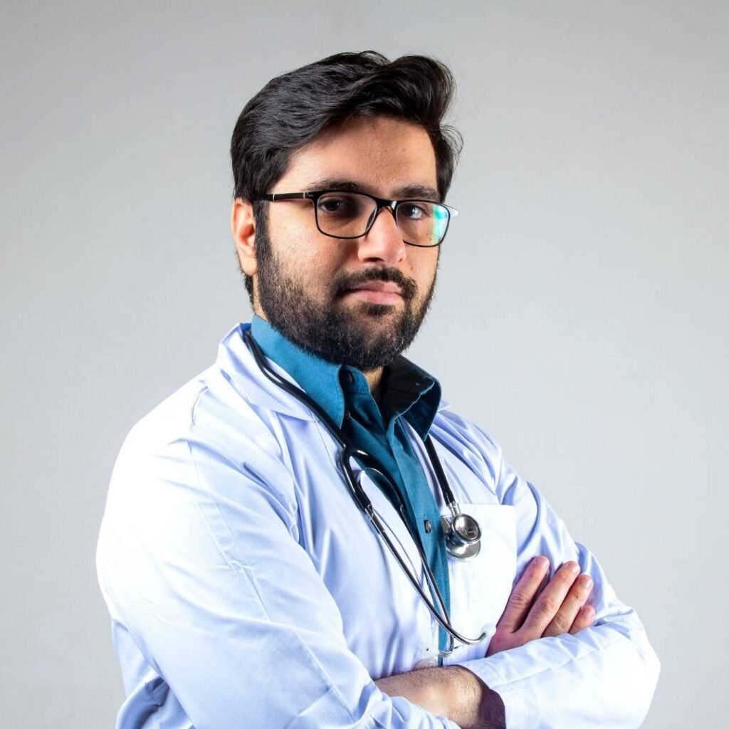 Global Community of Aesthetic Doctors at FAMCE A group of international aesthetic doctors in white coats confidently standing in a modern clinic